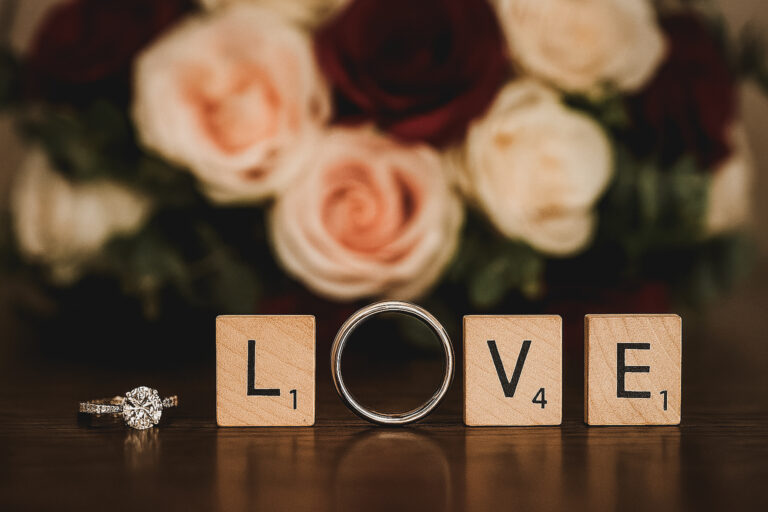 Scrabble pieces spell LOVE.